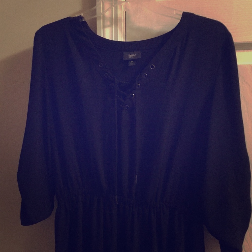 Black lace up dress. Slight high low hem!